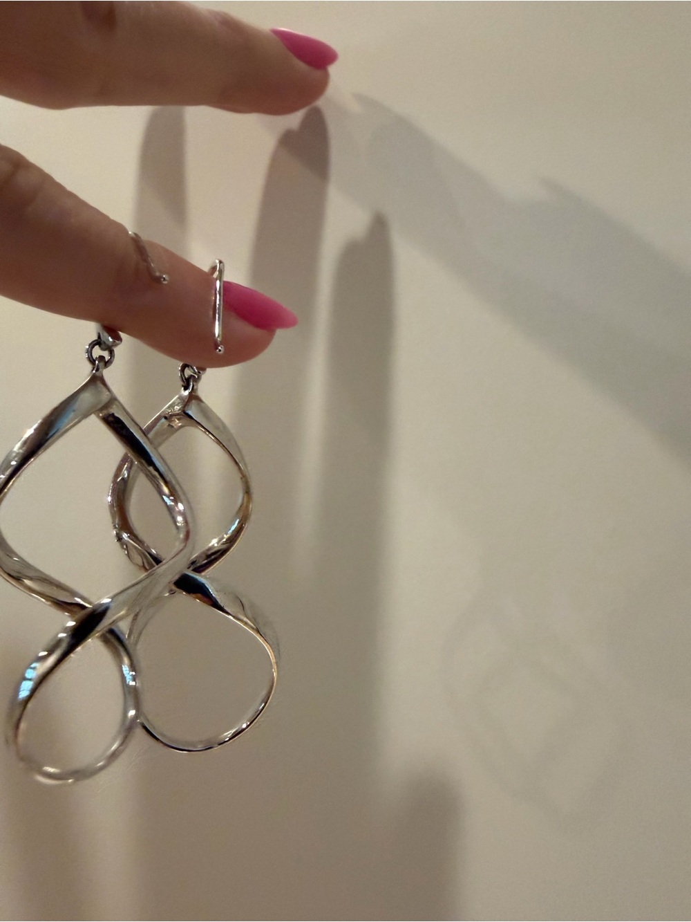 Touchstone Crystal Silver Twisted Drop Earrings with Crystal Accents - Picture 4 of 5
